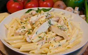 A plate of chicken parmesan pasta